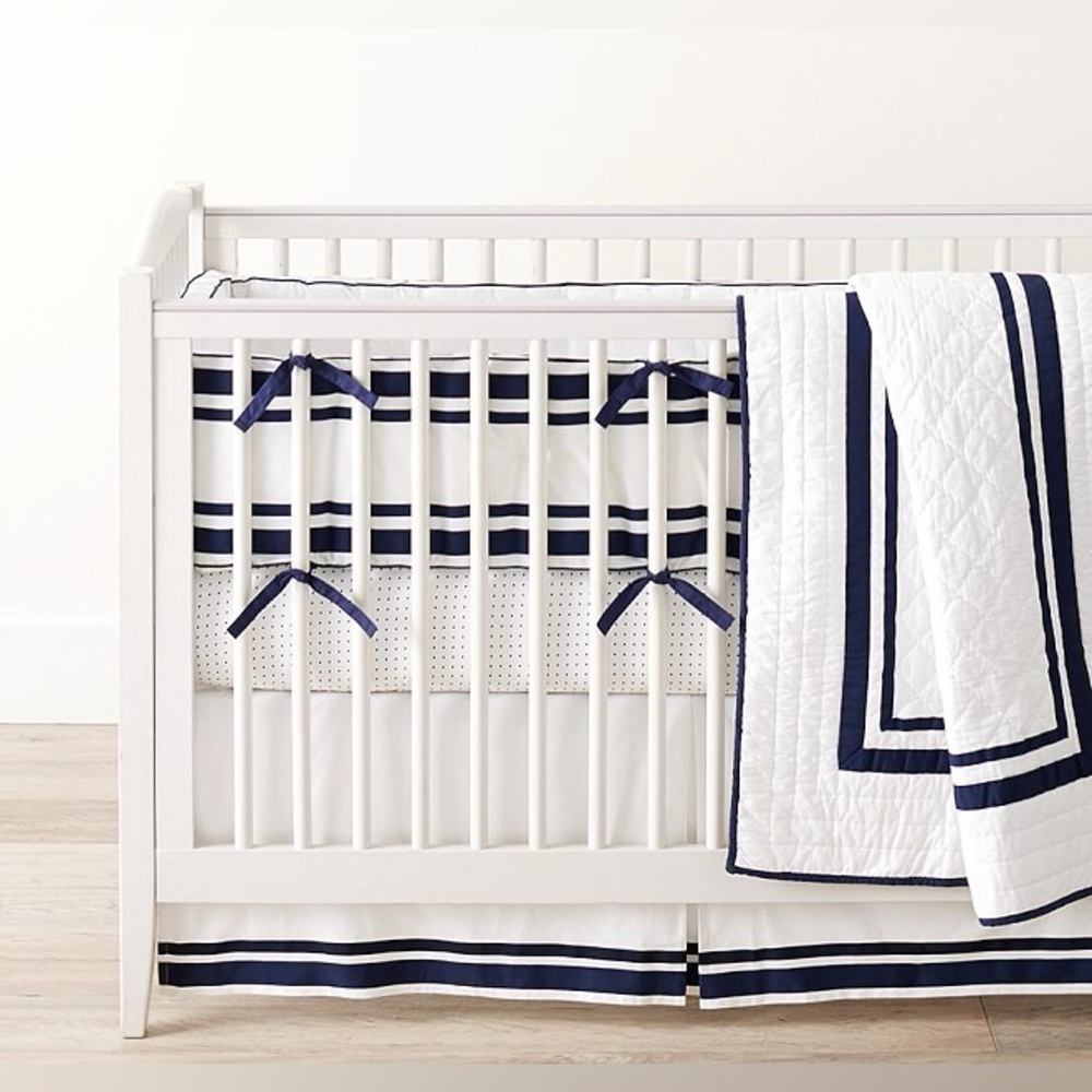 POTTERY BARN KIDS white Harper navy trim baby quilt